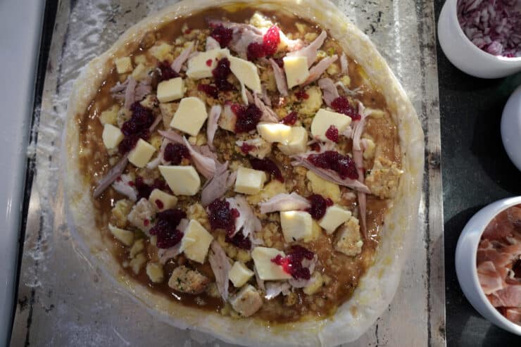 Thanksgiving pizza before being cooked. 